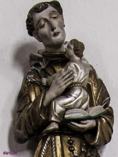 Silbern-goldene Figur des heiligen Antonius mit Jesuskind, Lilie und Buch